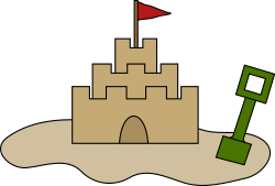 Sand castle by laobc - A sand castle with a shovel.