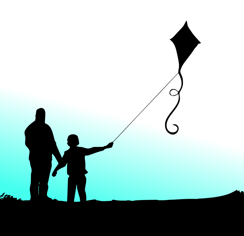 Father and kid with kite