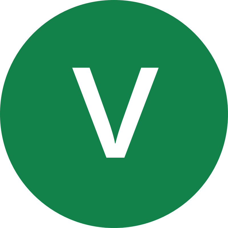 v symbol lowercase in green circle 