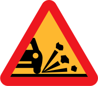 Loose stones on the road roadsign