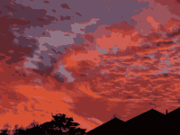 sunset over houses