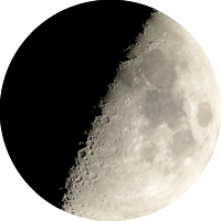 Isolated half-moon at night