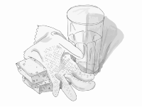 Sponges, plastic glove and a mug