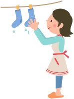 Woman hanging out laundry on the clothesline