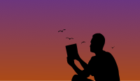 Man reading a book in sunset