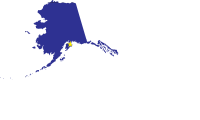 Alaska State Outline with Flag Background