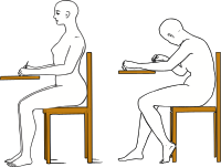 2 girls sitting exams side by side