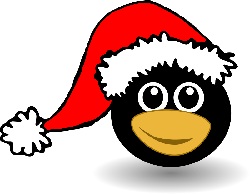 Funny tux face with Santa Claus hat