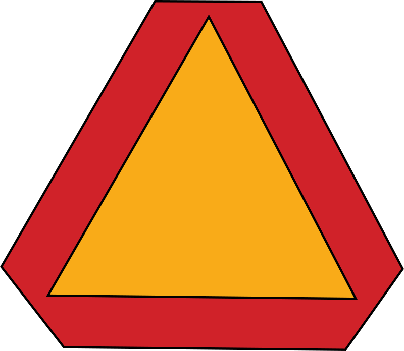 Slow moving vehicle sign