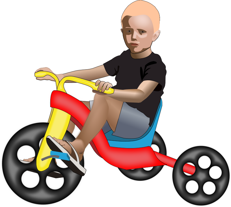 boy on tricycle