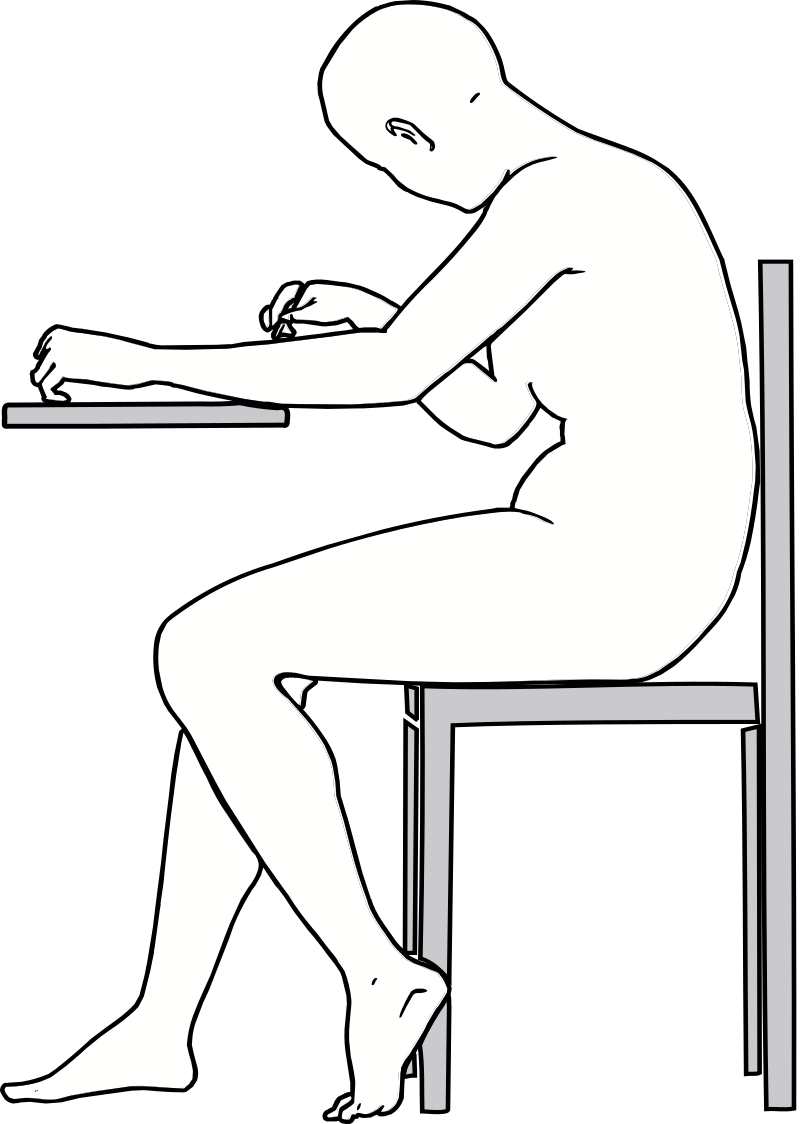Side view of woman writing at table